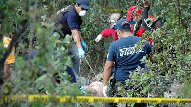 Cuerpos encontrados en fosa, no son de los desparecidos: Fiscalía